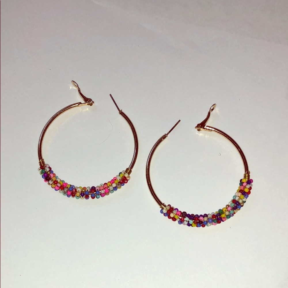Beaded hoop earrings. Approx 2 inches across.
